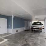 Teal Bliss Waterfront newly constructed home in Swann Keys carport and under-building storage