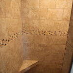 Teal Bliss Waterfront newly constructed home in Swann Keys tile shower detail built in seat